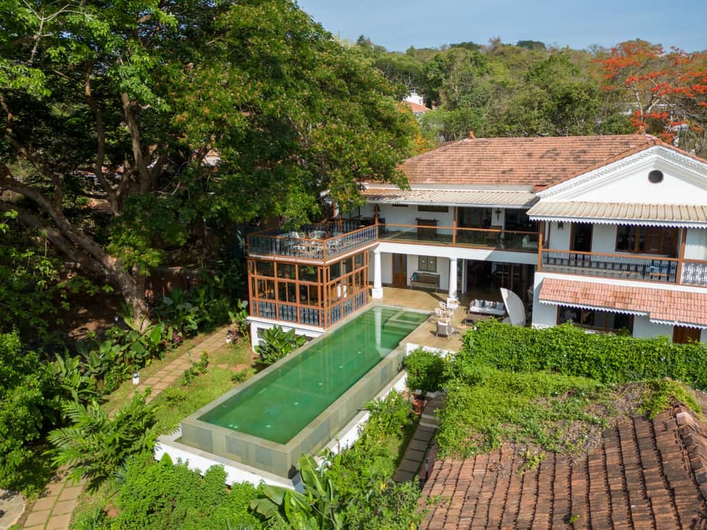Aerial view of the estate and stone infinity pool