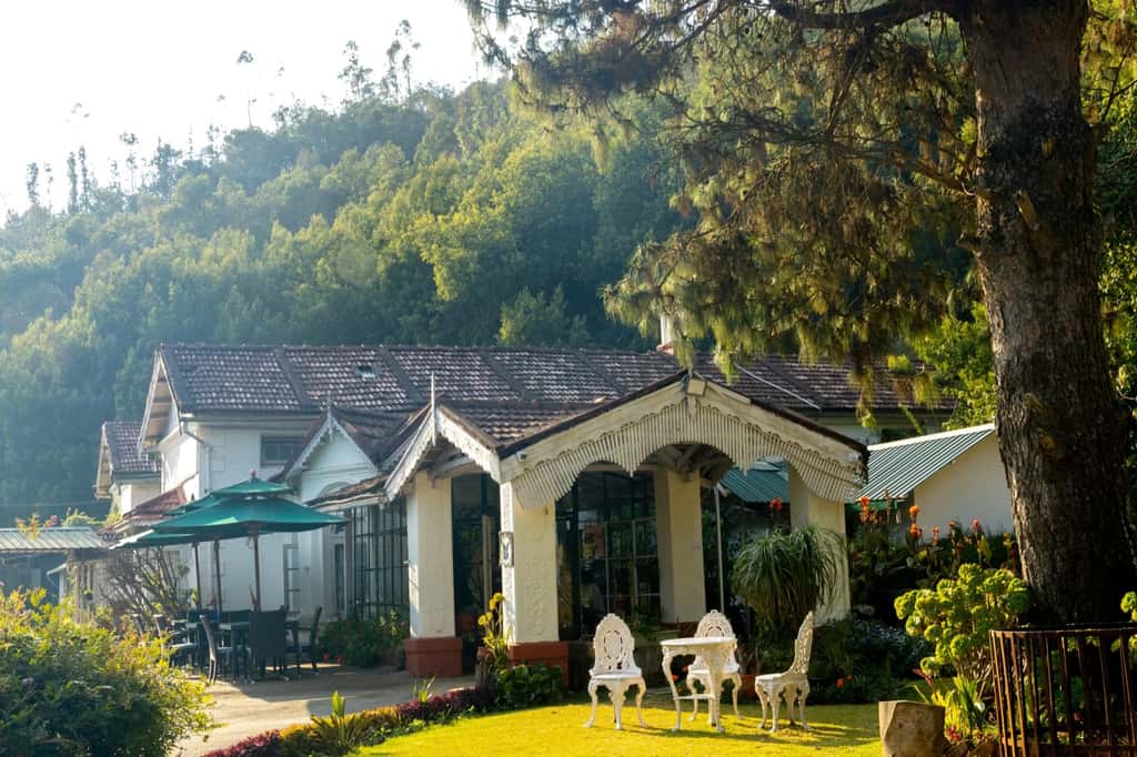 Mansion with arched verandah and lawn