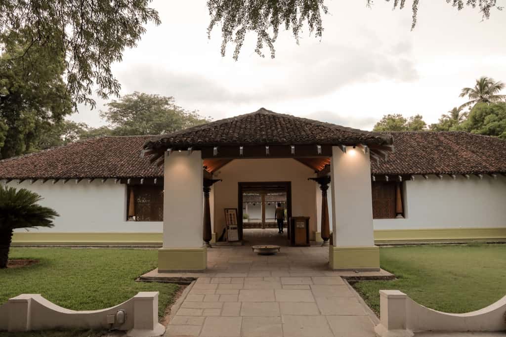 Tiled entrance pavilion with white columns
