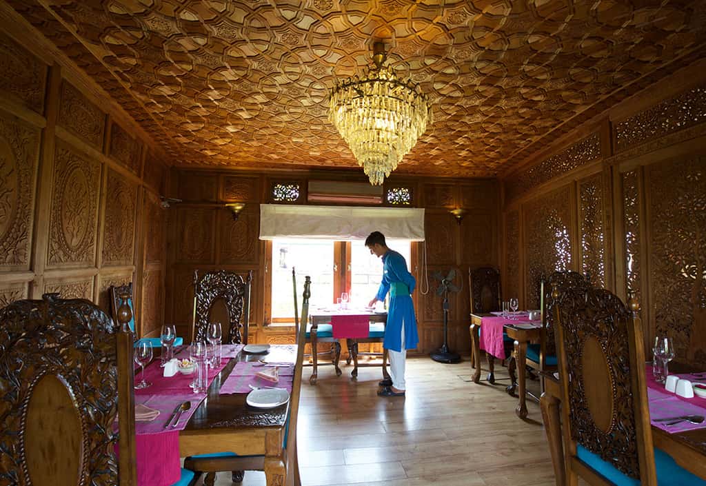 Dining room panelled in carved walnut