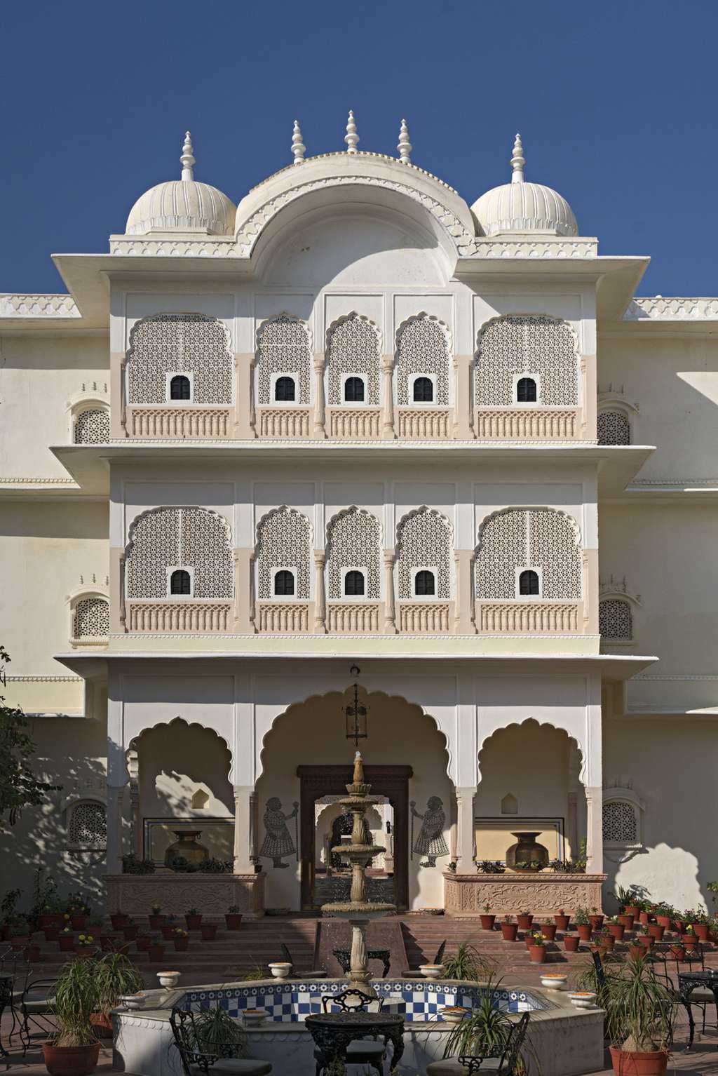 Arched balconies above a courtyard