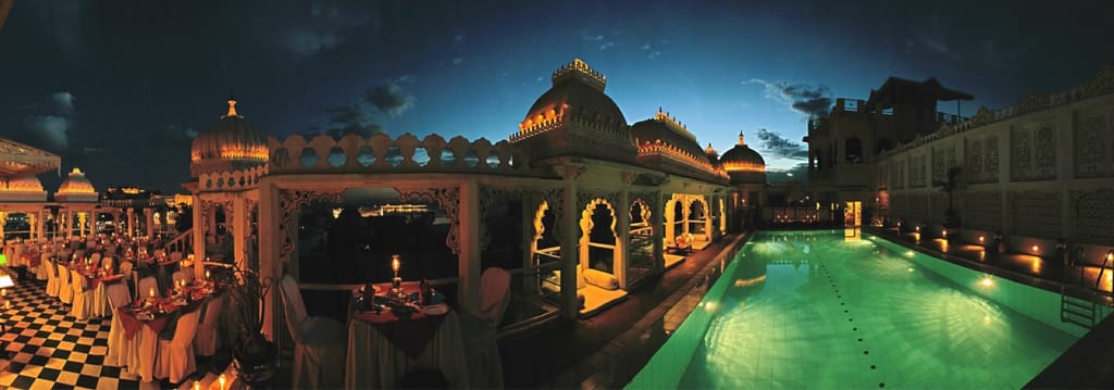 Udai Kothi rooftop pool at dusk, Udaipur