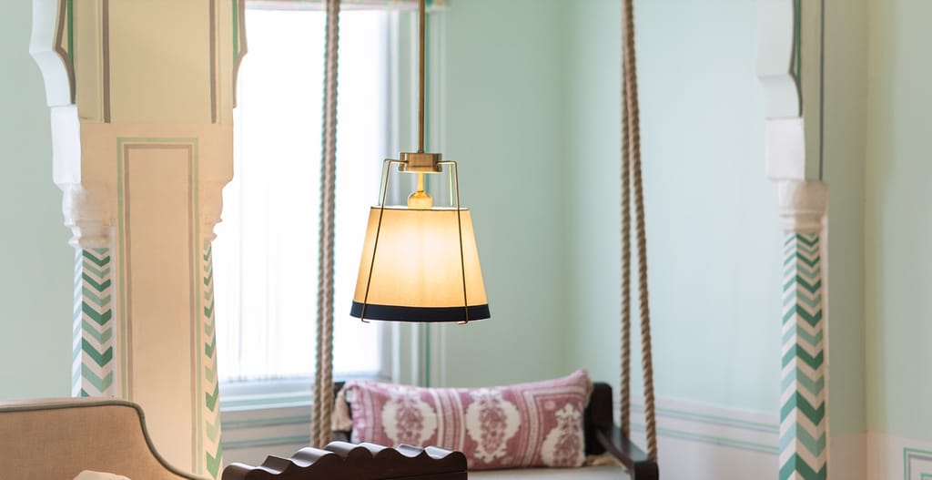 Rope swing seat and painted columns in a mint-green suite, Padmaa, Jaipur