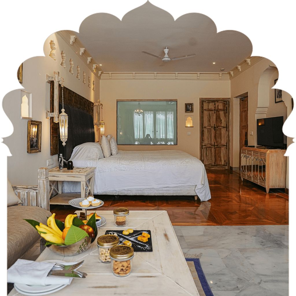 Narlai Suite bedroom with carved headboard, lanterns and parquet floor, Rawla Narlai, Narlai