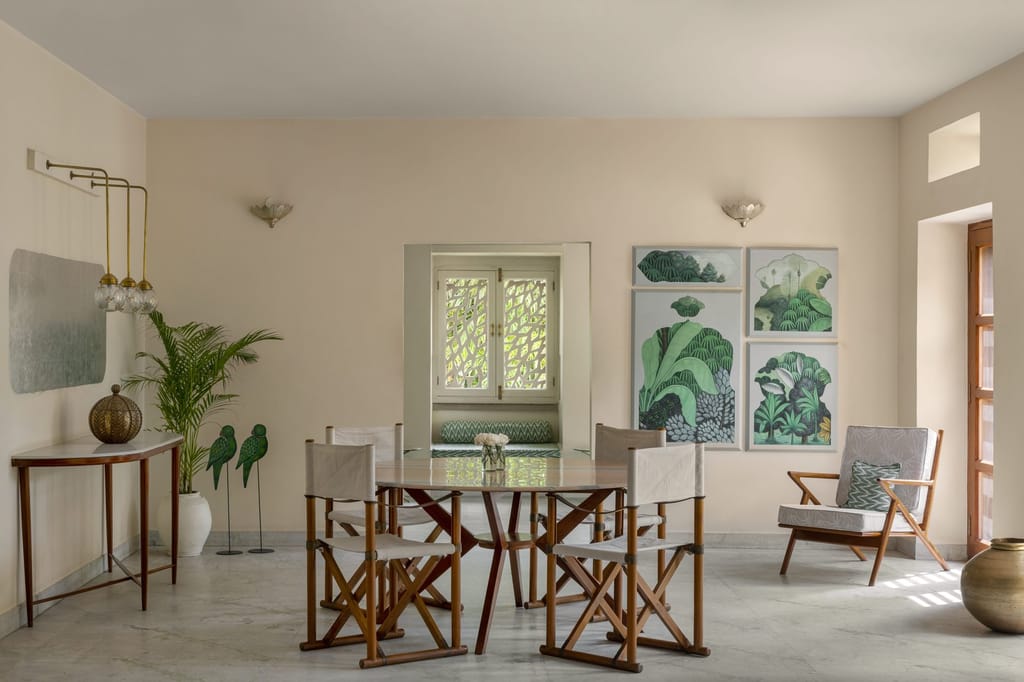 The day room, with its palm prints and cane chairs