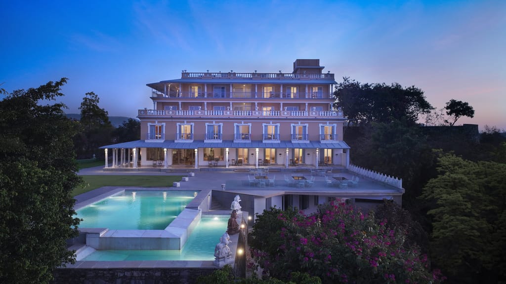 Facade with pool and sitting area
