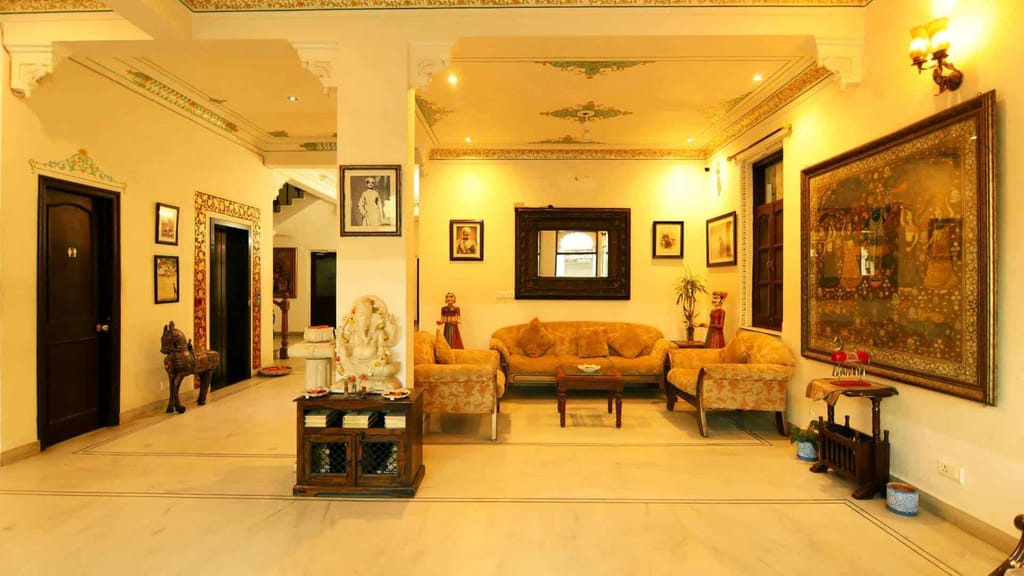 Sitting hall with murals and traditional furniture