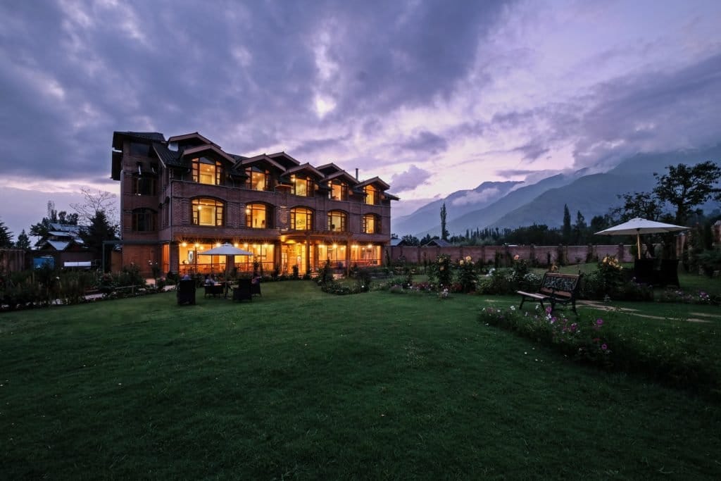 Nadis at dusk, the house and its garden under the Zabarwan hills