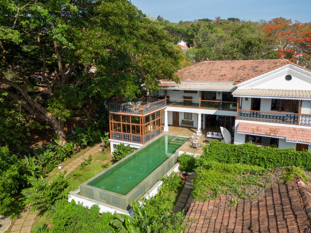 Aerial view of the estate and stone infinity pool