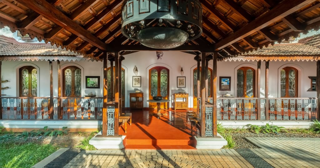 Central hall with timber roof and carved balustrades