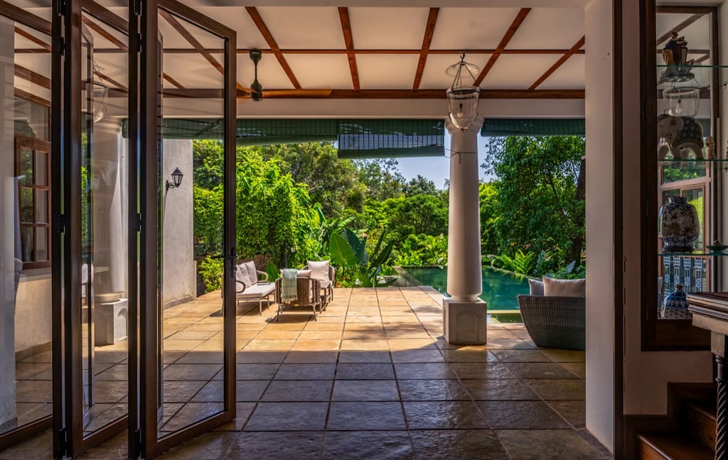 Verandah with folding doors open to the pool