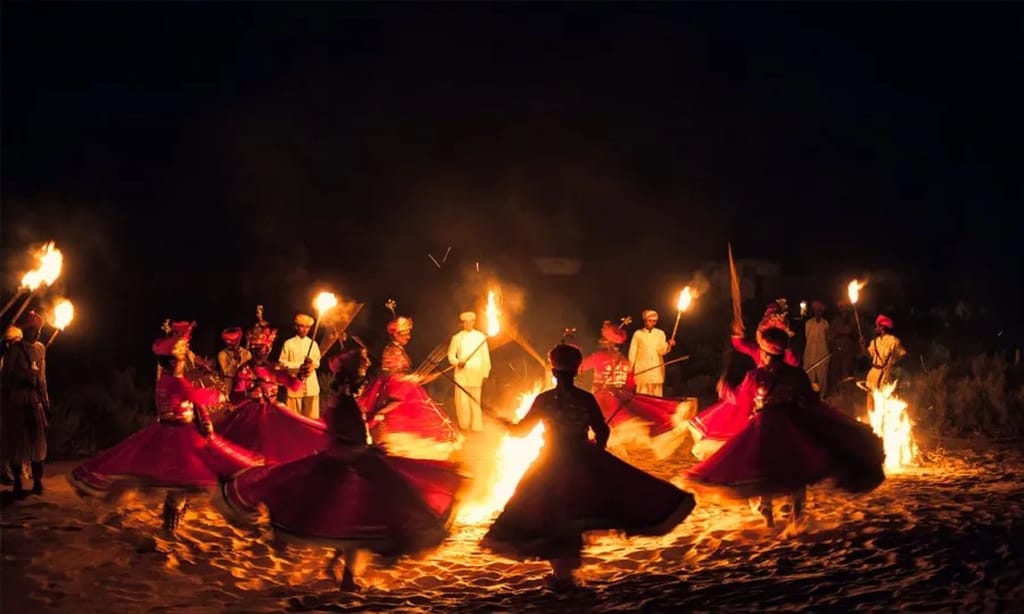 Kalbelia dancers by firelight in the Thar