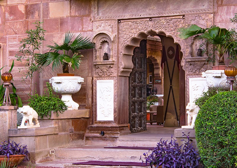 Carved entrance doorway with stone elephants