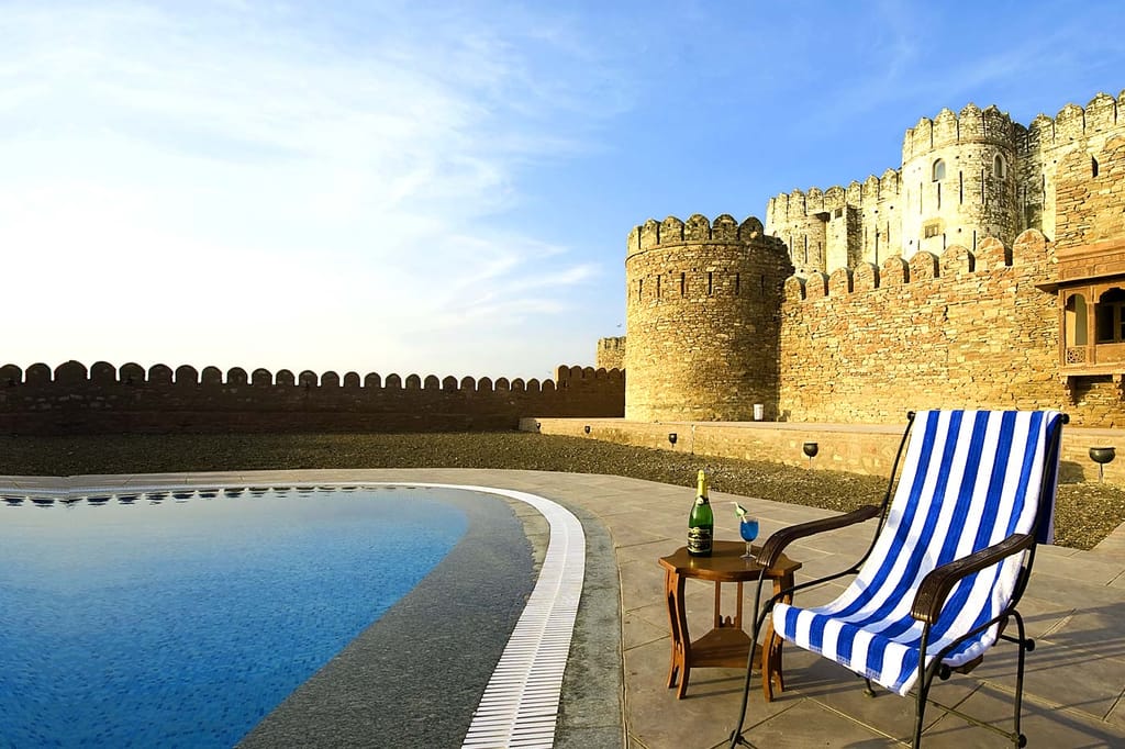 Deckchair by the pool under the ramparts