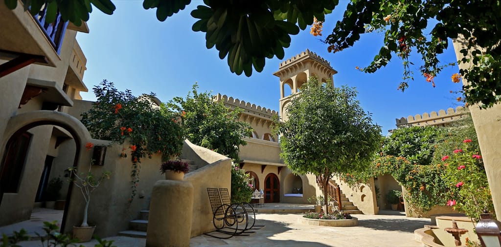 Inner courtyard with tower and trees