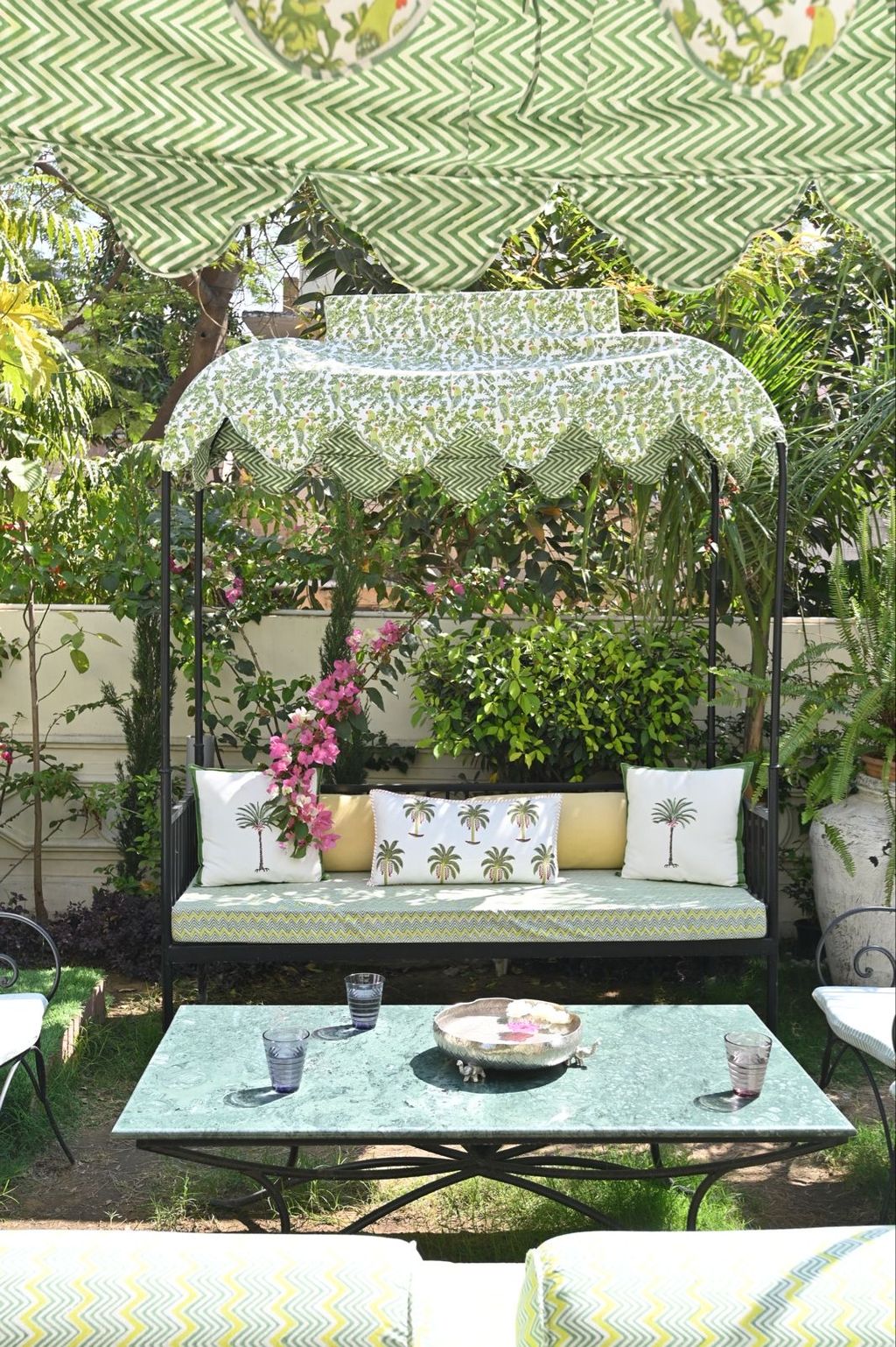 Garden swing seat under a printed canopy