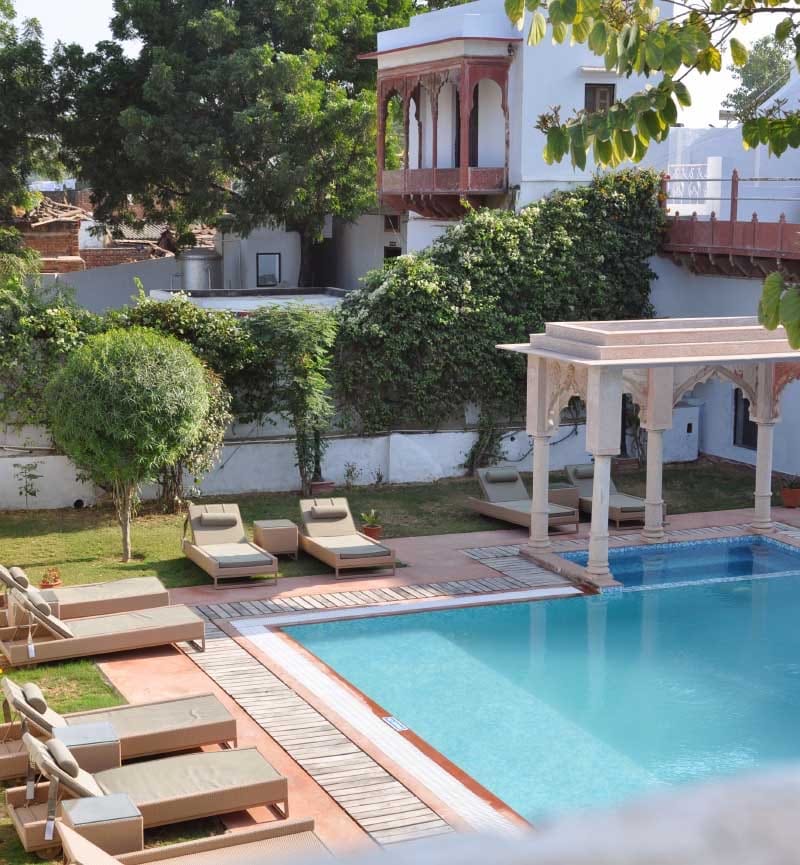 Poolside loungers and garden