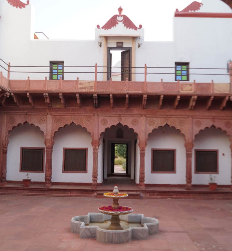 Sandstone courtyard with central fountain