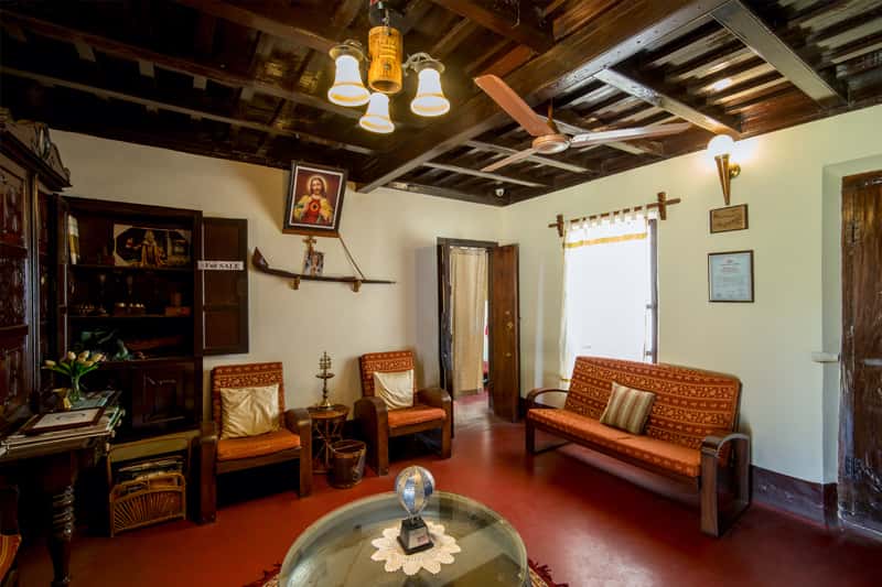 Sitting room under a beamed teak ceiling