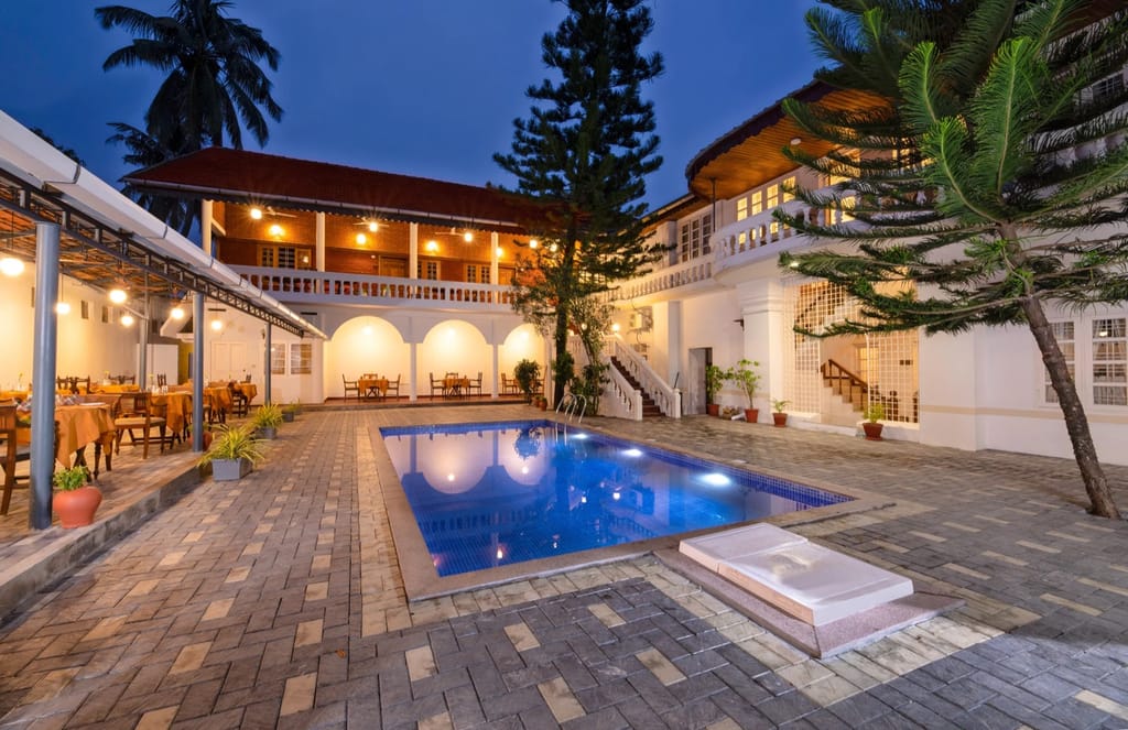 Courtyard pool at dusk inside the bungalow