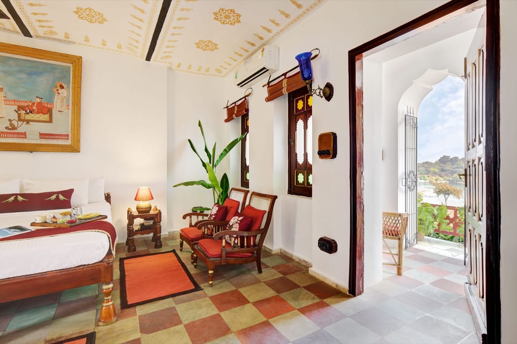 Riverside room with painted ceiling and chequered floor