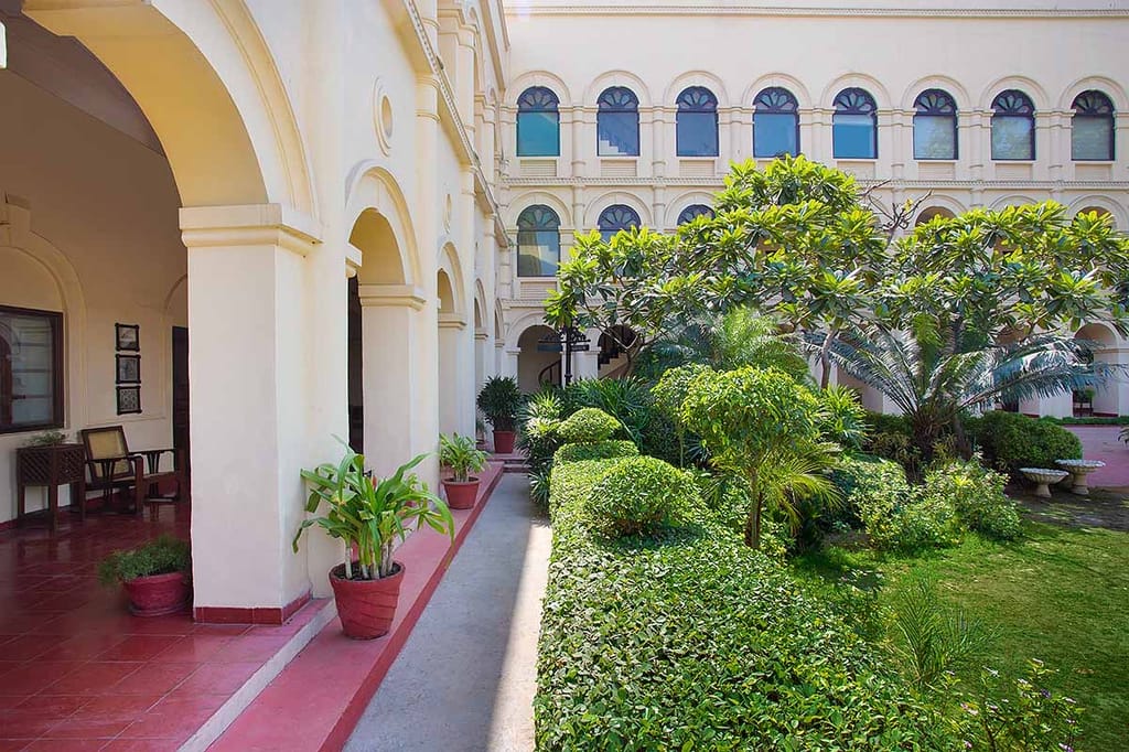 Red-tiled veranda beside the planted courtyard