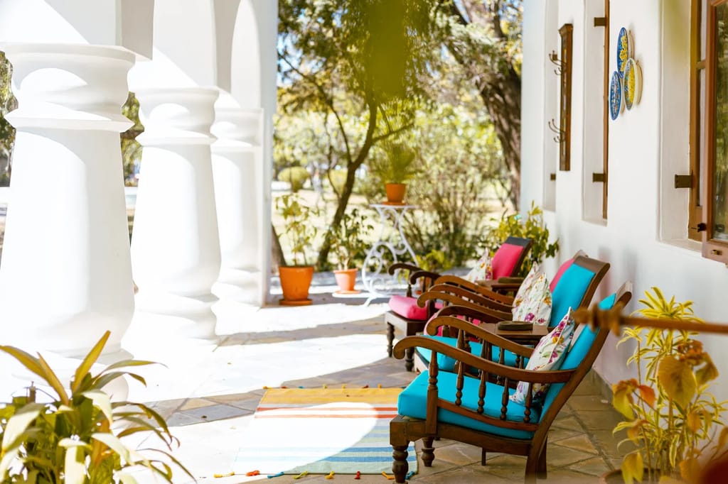 Colonnaded verandah with painted chairs