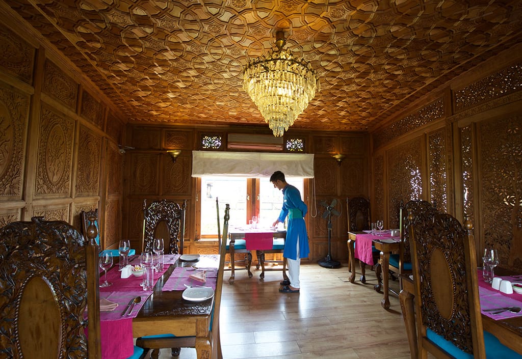 Dining room panelled in carved walnut