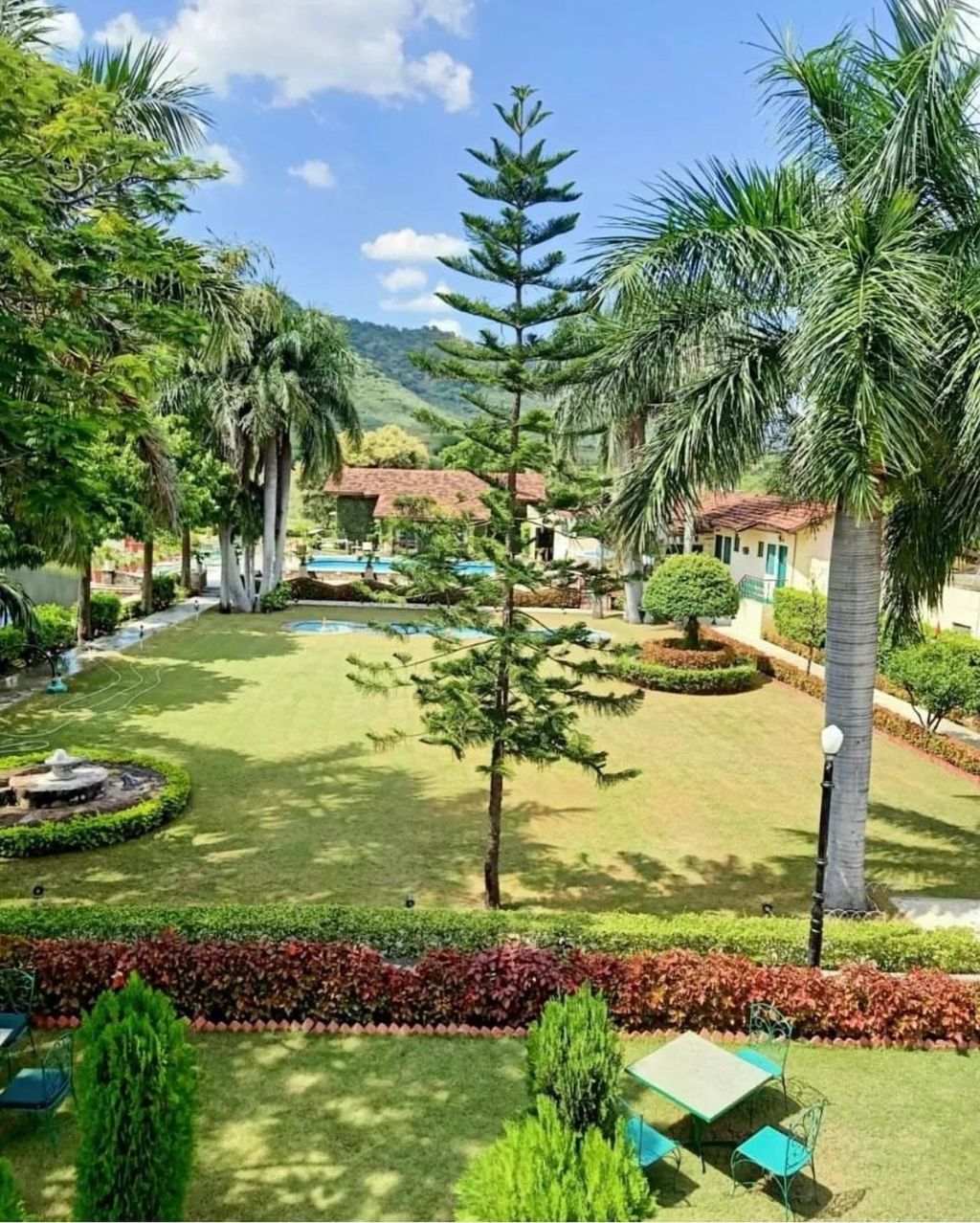 Lawns and gardens with the pool beyond