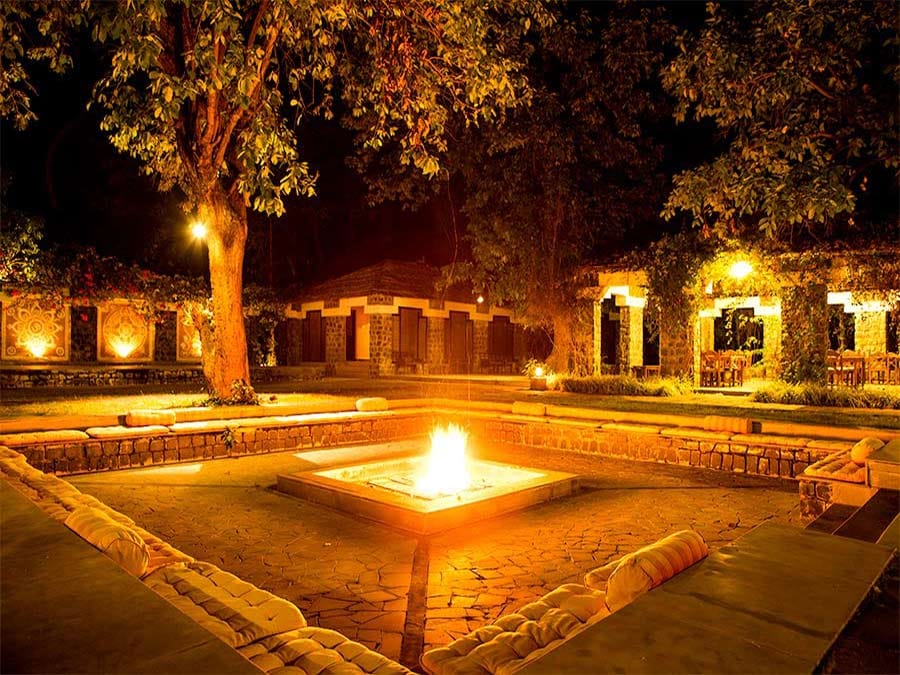 The fire court at night, lit along its length