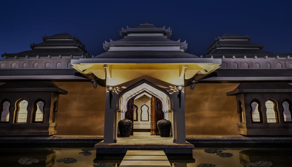 The ornate entrance gate at night
