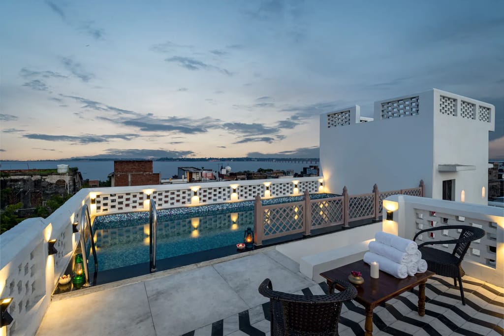 Rooftop pool overlooking the river at dusk