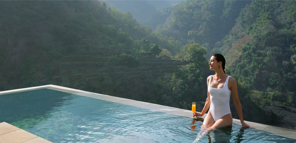 Poolside with valley view (site alt: Poolside with View from Taj Rishikesh, Uttarakhand - Banner Image)