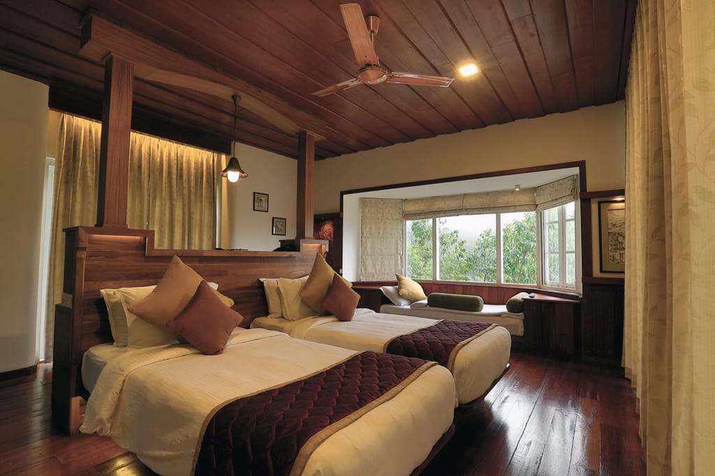 Classic Cottage with Jacuzzi bedroom with twin beds, timber ceiling and bay window seat, Spice Tree Munnar, Munnar