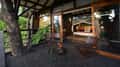 The deck of a treehouse at Pench Tree Lodge