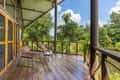 The sit-out deck of a cottage at Pench Tree Lodge