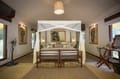 The four-poster bed in a Tented Jungle Suite
