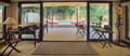The lounge of the Royal Suite (Sher), open to the pool