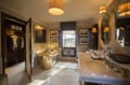 The brass bath and dressing room in the Imperial Suite (Raj Bagh)