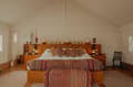 The bed in a Luxury Tented Suite at The Serai