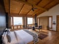Villa bedroom looking to the lake at Qayaam Gah