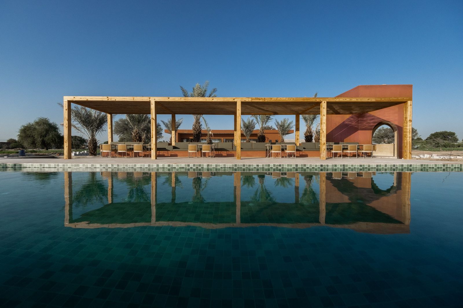 The pool and its pergola reflected at dusk, Mharo Khet farm stay, Jodhpur