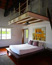 Heritage room with split-level mezzanine above the bed