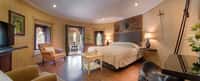 Suite bedroom with sitting area