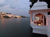 Candlelit marble pavilion standing over the lake
