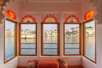 Bay window with stained glass fanlights over the lake