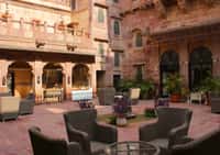 Seating in the sandstone courtyard