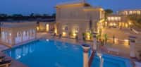 Swimming pool beside the palace at dusk