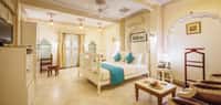 Suite bedroom with white walls