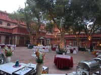 Tables set in the Dungar Niwas courtyard